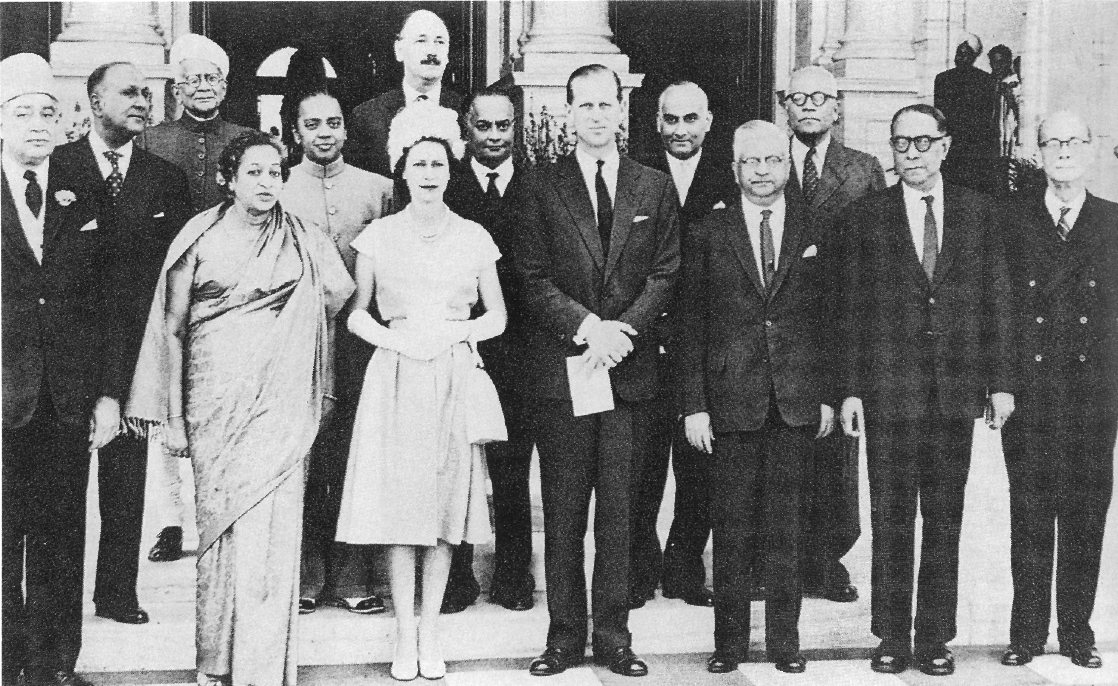 FICCI leaders with Queen Elizabeth and Prince Philip.
                                                        In the picture with the British royal couple are the Maharaja of
                                                        Burdwan, Sir Biren Mookerjee, Sir Badridas Goenka, Smt Padmaja T
                                                        Naidu, Shri B. M. Birla, Shri S Gupta, Shri Sachin Chowdhry and
                                                        Sir B. P. Singh Roy